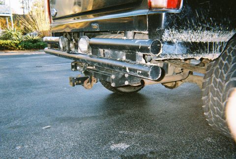 1996 Ford Bronco - Rear view of a 1996 Ford Bronco, showing its heavy-duty bumper and tow hitch.
