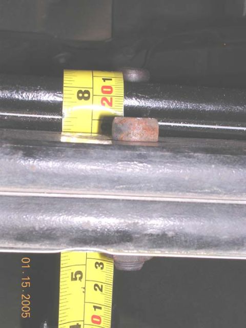 2004 Ford F-250 - A close-up view of a measuring tape on metal components, with a date stamp of 01.15.2005 visible.