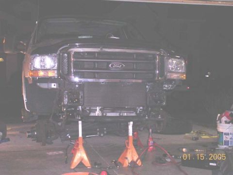2004 Ford F-250 - used the front crossmember to support the weight of the vehicle. this swap requires removing the bumper and disconnecting the swaybar. It c…