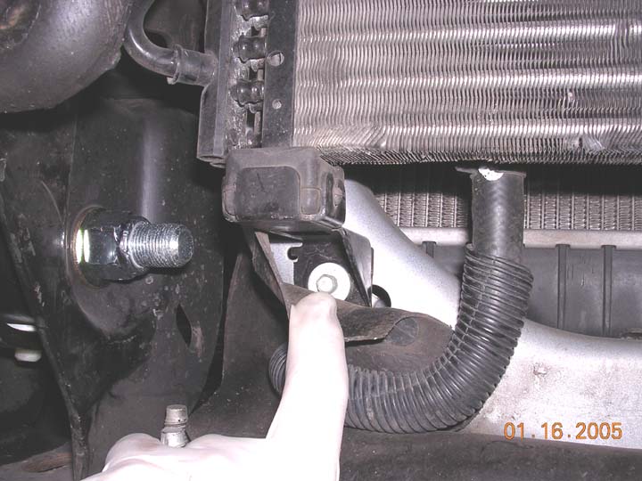 I FUBARed the first bolt.  Not sure if it was the beers or just plain stupidity, but I missed that there was a bolt on this bracket.  it was in the way of the front leaf spring bolt and wouldnt allo the bolt to be removed.  so like an idiot I cut it out, which requied reaming the leafspring eye out to 3/4" to fit a standard 3/4" bolt instead of fords metric crap.