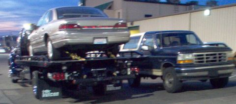 1994 Ford Crown Victoria - My boss bought this rollback (personally) 2 days ago, so he hauled my car away for practise.
