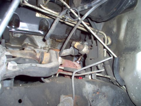 1994 Ford Crown Victoria - The filthy faded orange object in the center is the infamous cruise deactivator switch (SCDS). This one isn't being recalled because it's n…
