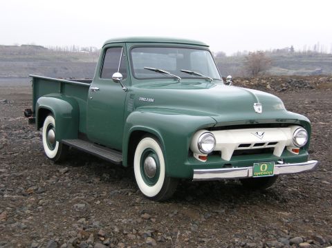 1954 Ford F-250 - This green 1954 Ford F-250 pickup truck is shown from a 3/4 front angle with an Oregon license plate.