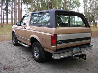 1994 Ford Bronco - This 1992 Ford Bronco is seen from its rear three-quarter angle, parked outdoors.