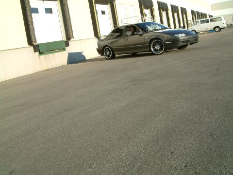 1992 Saturn SL - Wheels painted to match car.