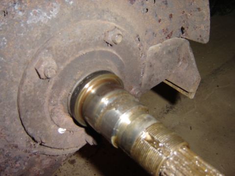1992 Ford Bronco - Close-up view of a wheel hub assembly, showing a splined axle shaft and bearing seal.