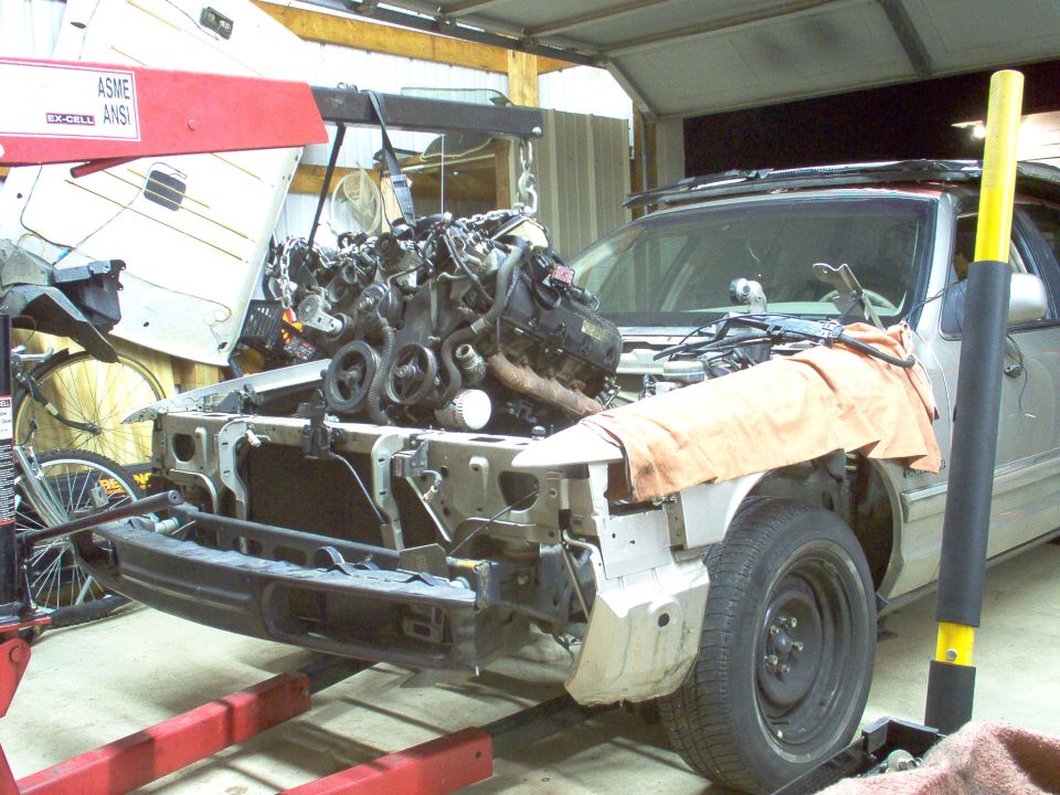 Since the engine seized, I can't rotate the flexplate to unbolt the torque converter, and I don't want to risk any damage to the recently-rebuilt trans, so they're coming out together.