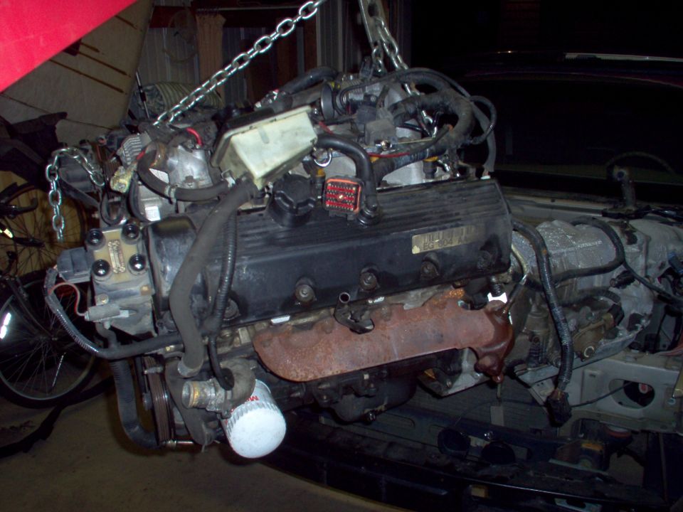 Since the engine seized, I can't rotate the flexplate to unbolt the torque converter, and I don't want to risk any damage to the recently-rebuilt trans, so they're coming out together.