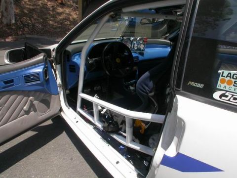 1990 Ford Probe - Reinforcing driver bars for added safety.