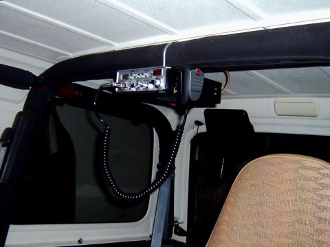 1998 Jeep TJ - CB radio mounted inside a Jeep's interior, near the roll bar.