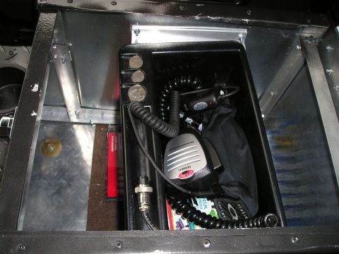 1996 Ford Bronco - Custom center console modification a CB radio, microphone, and storage for coins.