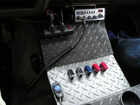 1996 Ford Bronco - Custom center console modification with CB radio and auxiliary switches installed.