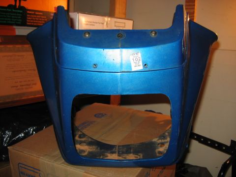 1985 Ford LTD Crown Victoria - Blue motorcycle fairing with a "102" sticker visible on the front.