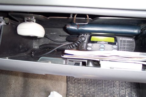 1995 Ford Bronco - moved it from a center fire console to the glove box for a stealthy look and the box actually amplifies the volume alot.
