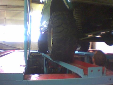 1979 Ford Bronco - I took my bronco to the shop to have some tell pipes put on when they pulled it into the bay my tires were alittle to wide for the ramps.