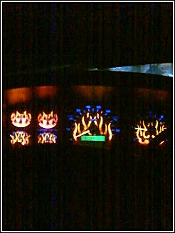 1993 Ford Bronco - The illuminated dashboard gauges glow in the dark, displaying a unique flame design.