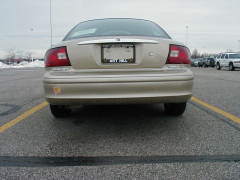 2001 Mercury Sable - Rear view of a tan 2001 Mercury Sable LS parked in a lot.