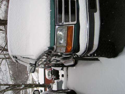 1996 Ford Bronco - 1996 Ford Bronco parked in the snow.
