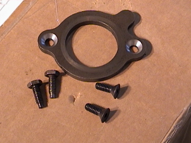 Cam thrust plate with holes countersunk(with new and old style bolts).