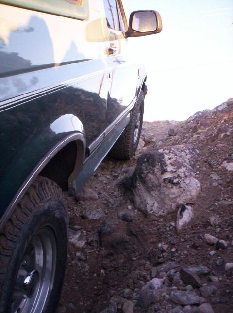 1996 Ford Bronco - This 1996 Ford Bronco is navigating a challenging rocky path.