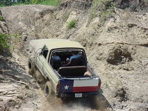 1978 Ford Bronco - This 1978 Ford Bronco is navigating a steep, dusty incline during an off-road excursion.