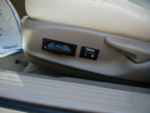 2001 Mercury Sable - Interior shot showing power seat and pedal adjustment controls.