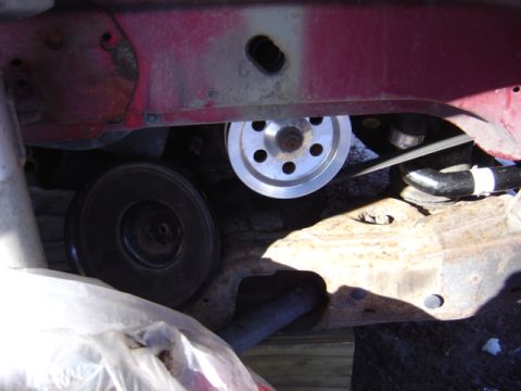 1998 Ford Taurus - Engine bay detail showing belt pulleys and associated components.