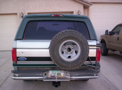 1996 Ford Bronco - The rear of a 1996 Ford Bronco is shown, a spare tire and a license plate.
