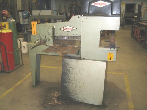 1991 Ford Bronco - Industrial metal shear machine with "METAL MUNCHA" logo visible on the upper housing.