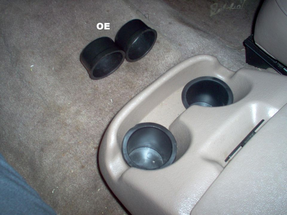 The aftermarket cupholders came from a boating supply store.  They're deeper, and have a slightly wider lip than the factory parts.