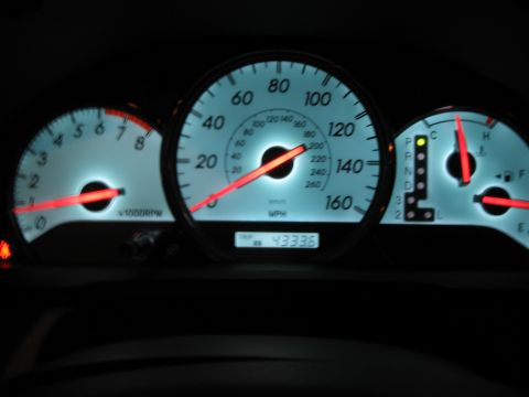 2004 Toyota Solara - The illuminated dashboard gauges show the odometer reading of 43336 miles.