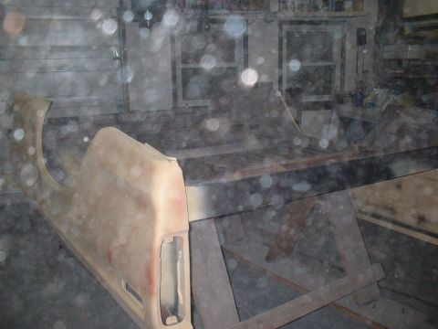 1978 Ford F-250 - Truck fender and bed panel undergoing restoration in a workshop.