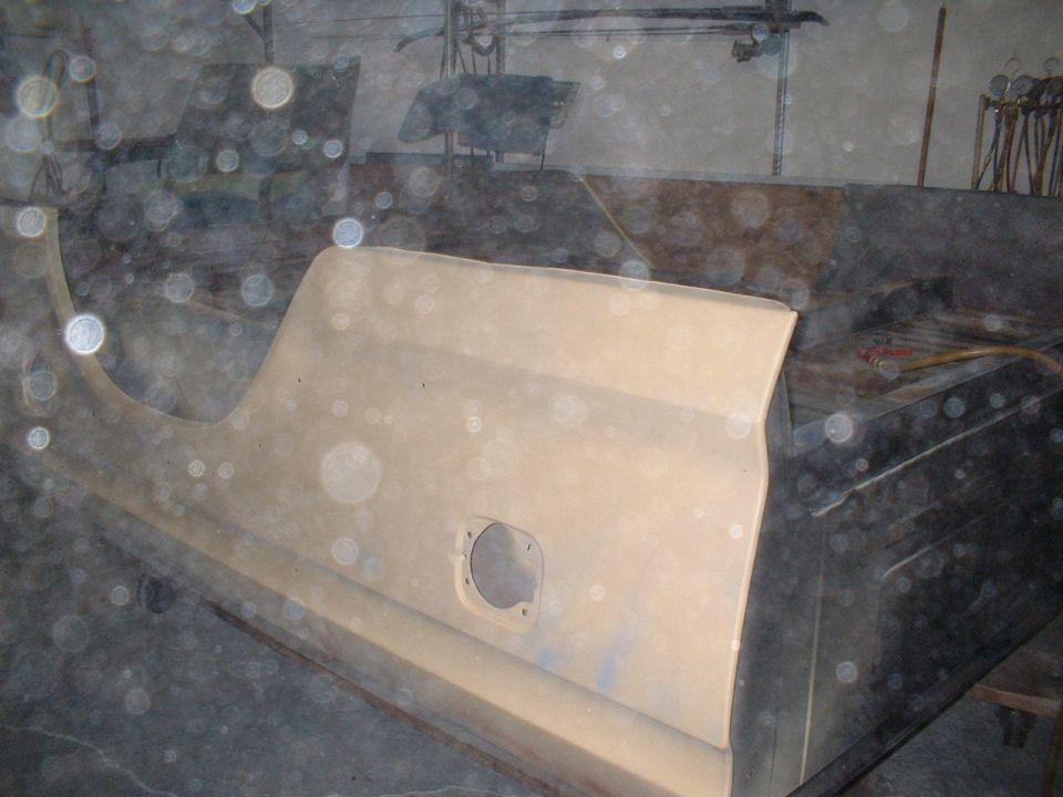 Beige truck door panel with circular cutout