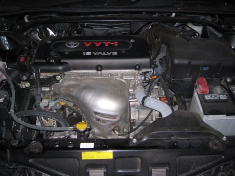 2004 Toyota Solara - Engine bay of a 2004 Toyota Solara, showing the VVT-i 16 valve engine and associated components.