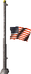 1979 Ford F-150 - An American flag waves on a flagpole against a dark background.