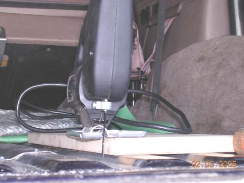 1994 Ford Bronco - And a jigsaw with a piece of 5/8 and 3/4 ply to keep the blade from hitting the tank. Special care needs to be taken as there are hoses tha…