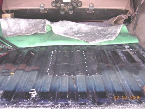 1994 Ford Bronco - Caulked and sheetmetal screwed in place. Not the prettiest thing, but should fill my needs. i used a piece of floor from another rig (and t…