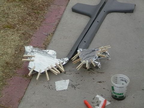 1995 Ford Contour - Car parts are being worked on outdoors, with foil and clothespins used for some sort of repair or modification.