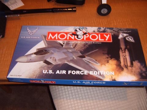 1988 Ford Bronco - Box art for the U.S. Air Force Edition of Monopoly, military aircraft and a rocket launch.