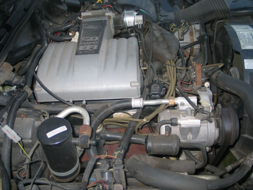 Ford 5.0 EFI engine bay with air conditioning components visible