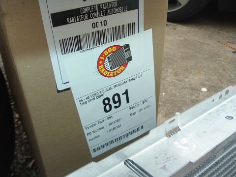 1993 Ford Taurus - A radiator part is shown with a label indicating it fits older Ford Taurus and Mercury Sable models.