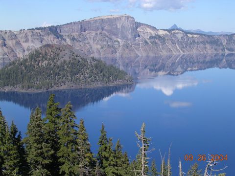 1994 Ford Bronco - Crater Lake National Park scene with Wizard Island and mountains reflected in the blue water. Date stamp reads 09.26.2004.