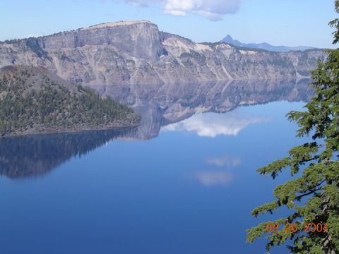 1994 Ford Bronco - A scenic view of a large lake with mountains and clouds reflected on its surface, dated September 26, 2004.
