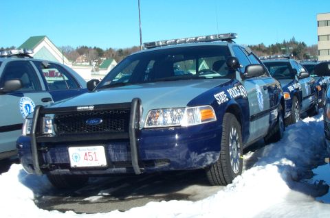 2001 Ford Crown Victoria - A line of Massachusetts State Police Ford Crown Victoria patrol cars parked in the snow.