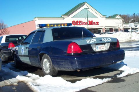 2001 Ford Crown Victoria - State Police Crown Victoria parked in snow outside an OfficeMax store.