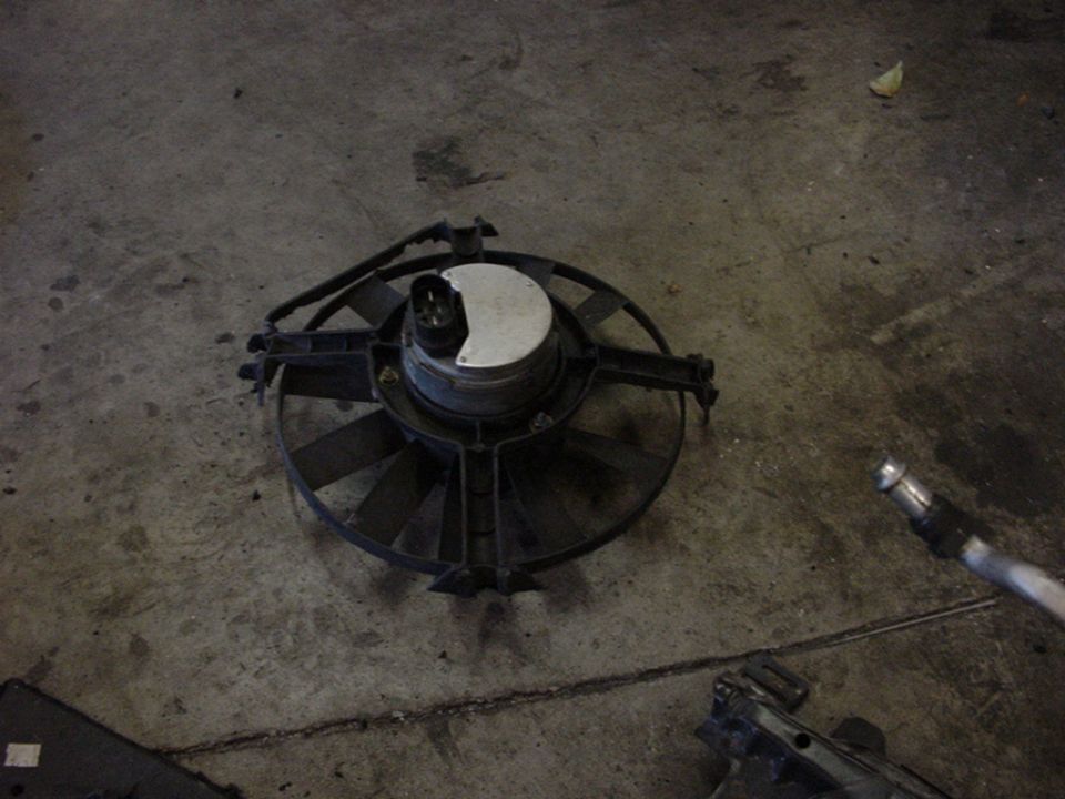 Radiator fan on concrete floor
