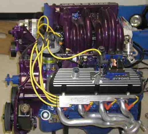 1988 Ford Bronco - Close-up of a Ford V8 engine, a custom purple intake and silver valve covers.