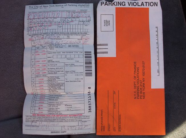 Parking violation notice and envelope