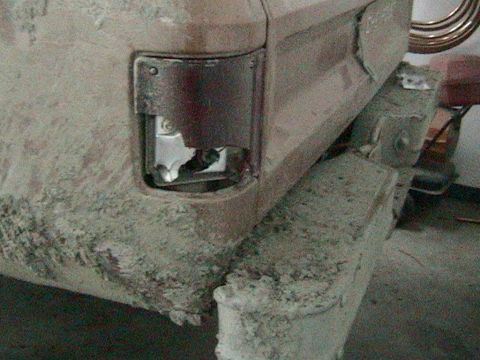 1981 Chevrolet C/K Pickup - Close-up of a damaged taillight on a 1981 Chevrolet C/K Pickup.