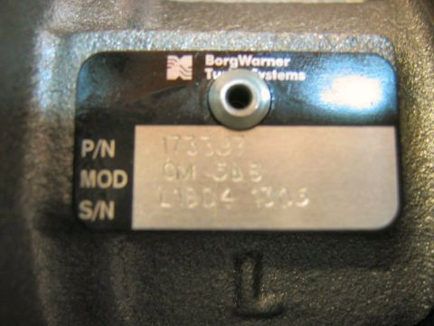 1985 Ford LTD Crown Victoria - This BorgWarner turbocharger identification plate shows part and serial numbers, not vehicle details.
